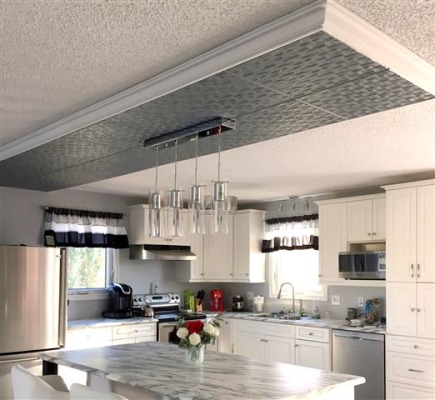 RM71 Polystyrene ceiling tile installed on a home ceiling