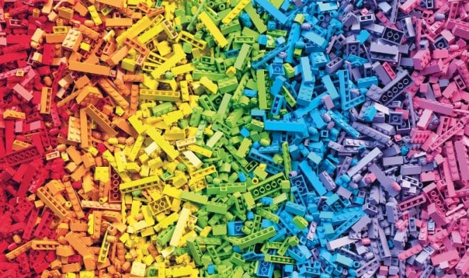 Rainbow toy blocks background. 3D Rendering