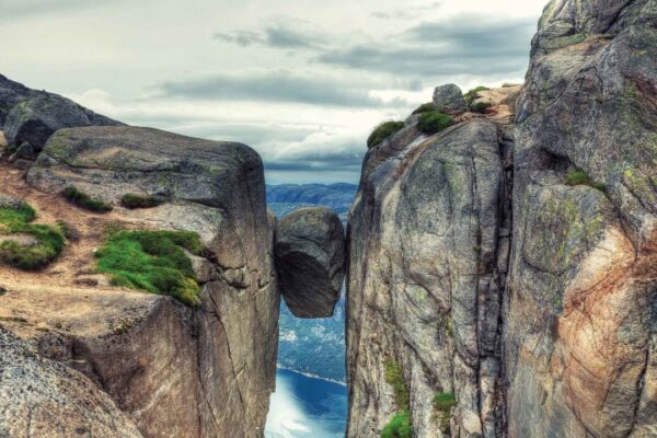 Kjerag Kjeragbolten rock in Kjerag Mountains, Norway