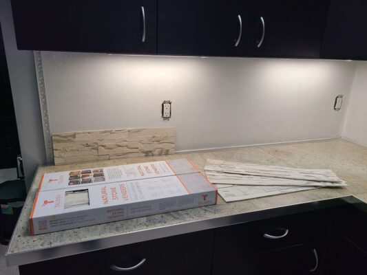 office stone veneer backsplash installation