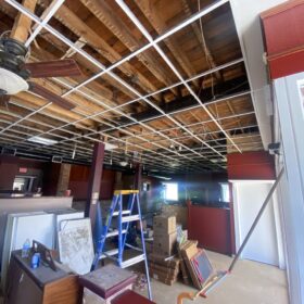 installing ceiling tiles in restaurant sutton