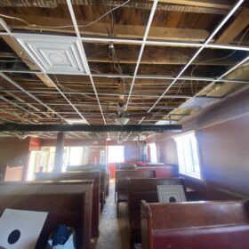 installing ceiling tiles in sutton restaurant