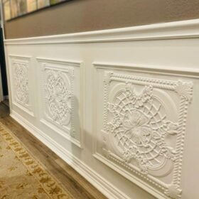 installing ceiling tiles in texas hallway