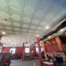 installing white ceiling tiles in sutton