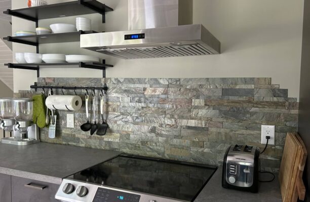 creating kitchen backsplash with stone veneer