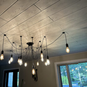 installing ceiling planks throughout home