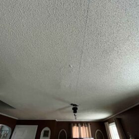 popcorn ceiling covered with styrofoam tiles