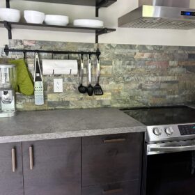 stone veneer installed as backsplash