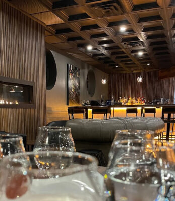 rockwell lounge installs ceiling tiles