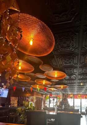 restaurant installs sleek black ceiling tiles