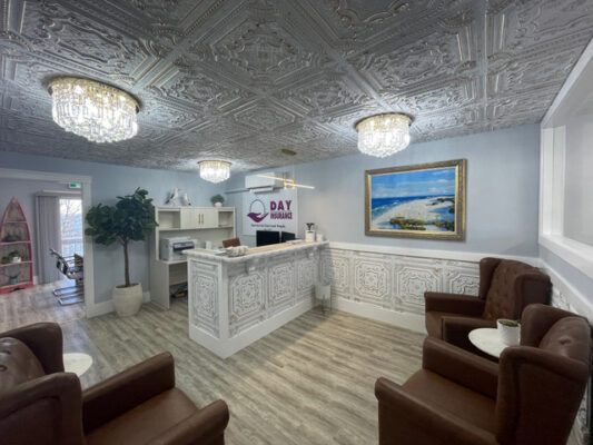 business office installs ceiling tiles