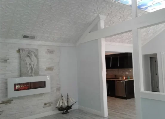 victorian ceiling tiles installed in family home