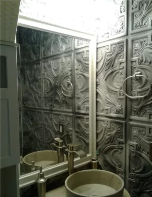 ceiling tiles installed on bathroom wall