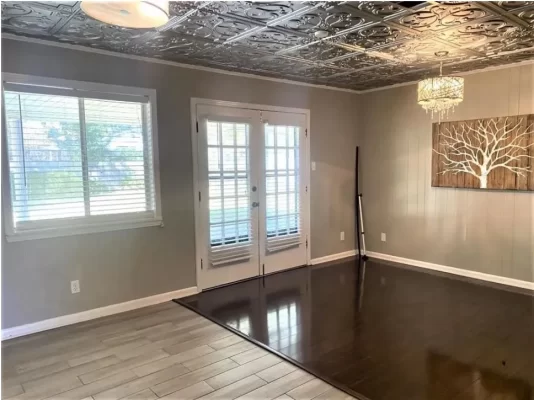 silver ceiling tiles transform apartment