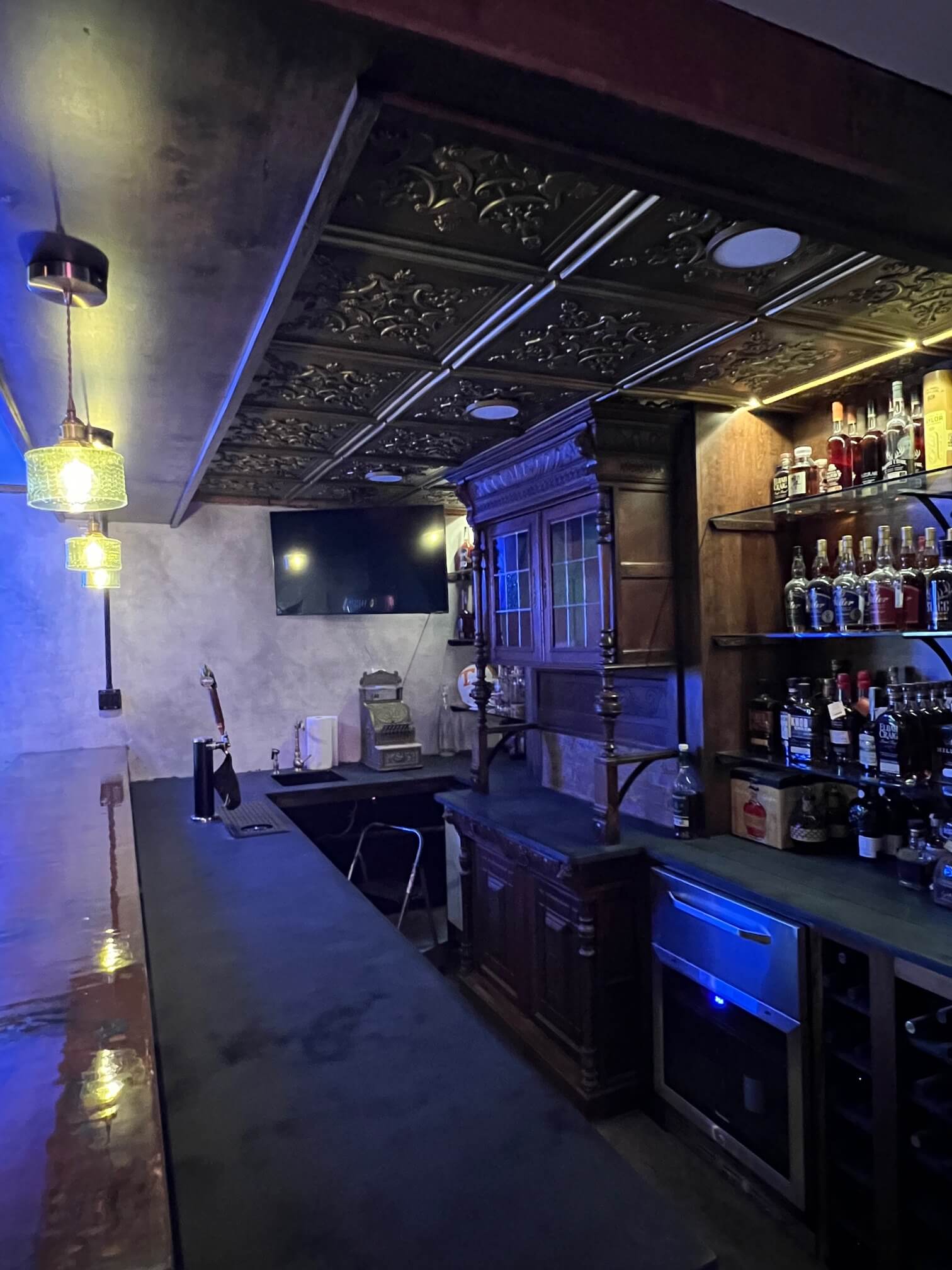 basement bar installs ceiling tiles