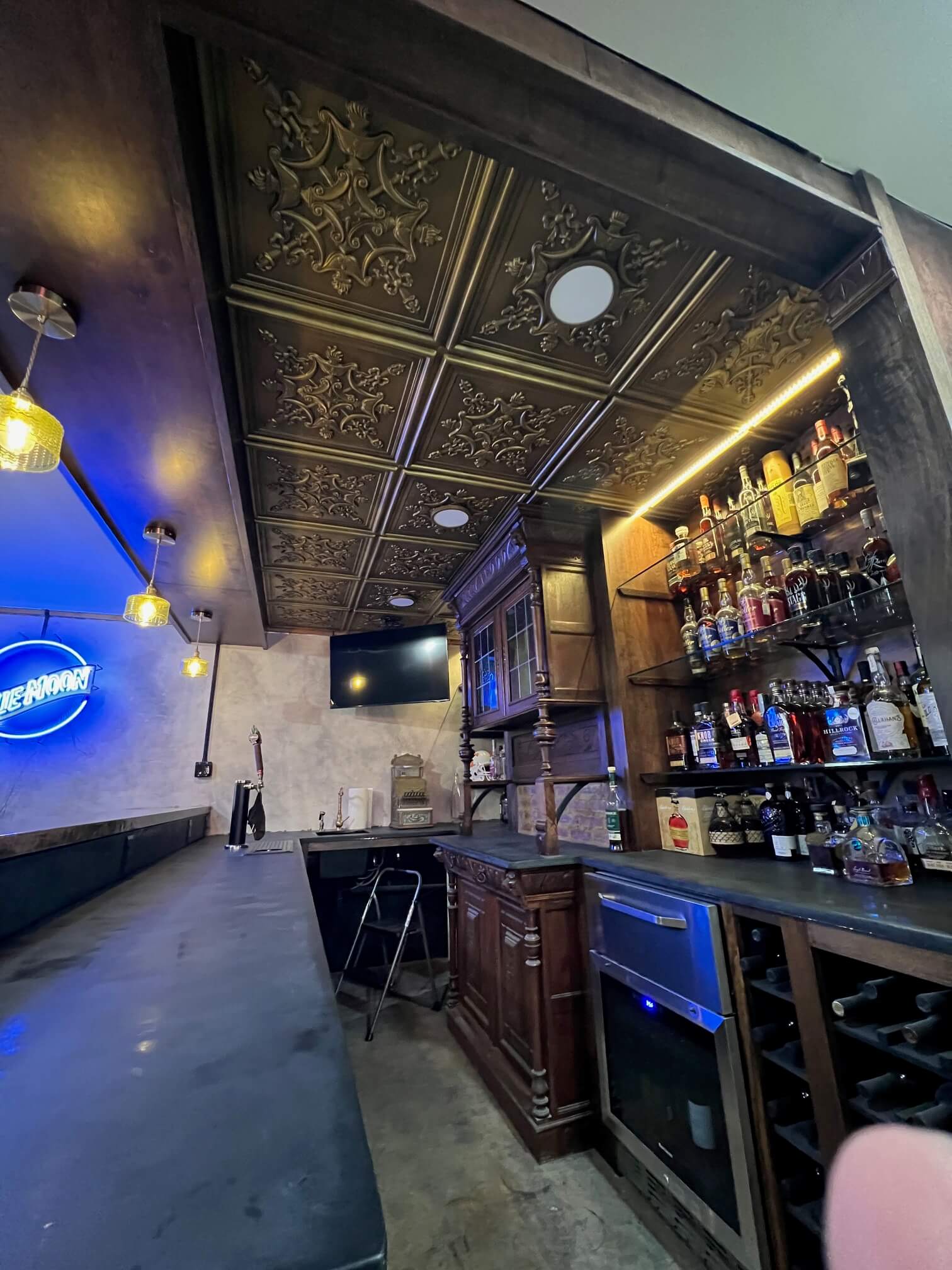 basement home bar installs ceiling tiles