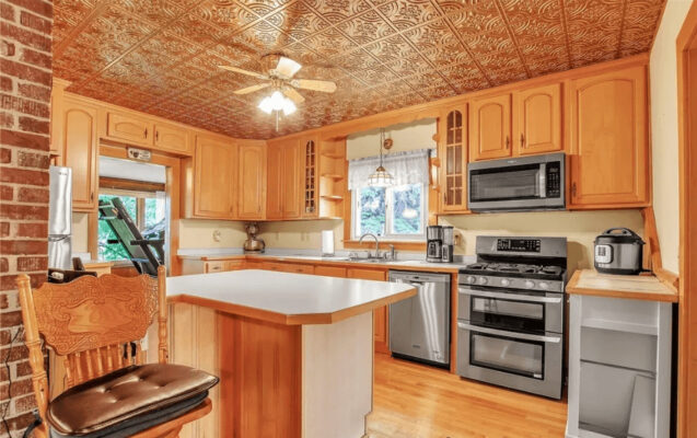 gold ceiling tiles adorn kitchen