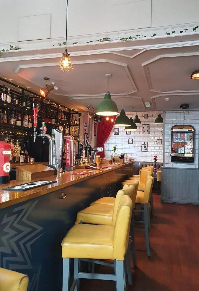 ceiling tiles installed after restaurant restoration before