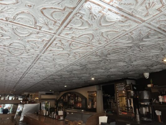 toronto restaurant installs victorian style ceiling tiles