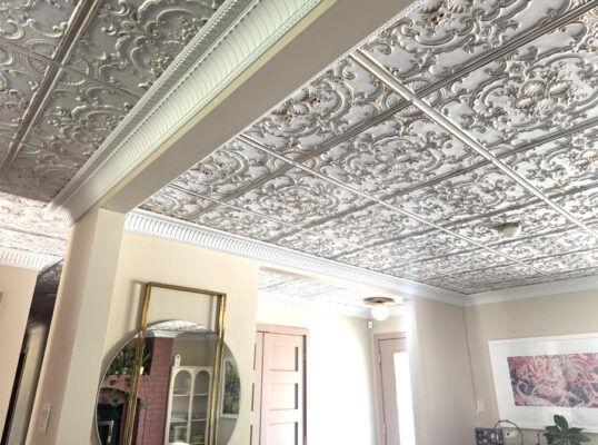 dining room with ceiling tiles