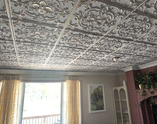 dining room with ceiling tiles
