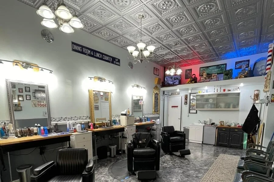 Spacious barbershop interior with 220 Silver Faux Tin ceiling tiles.