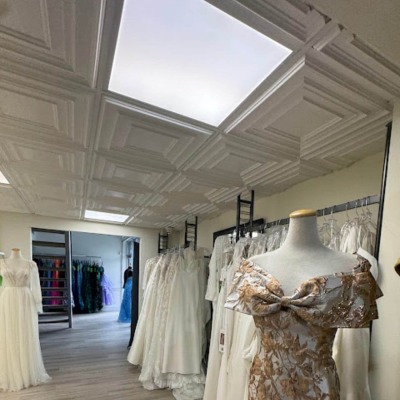 white matte ceiling tiles bridal store