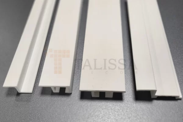 Close up view of the 04-915 High Density Polymer Crown Molding profile, showing the built-in channel designed for easy LED crown molding installations.