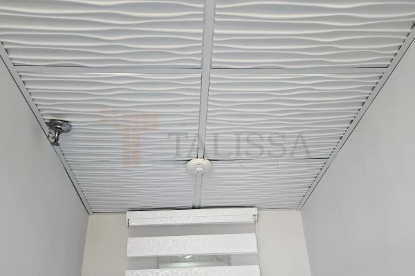 Room ceiling before the LED crown molding installation, displaying the bare 3D wave panels prior to finishing with 04-915 High Density Polymer Crown Molding.