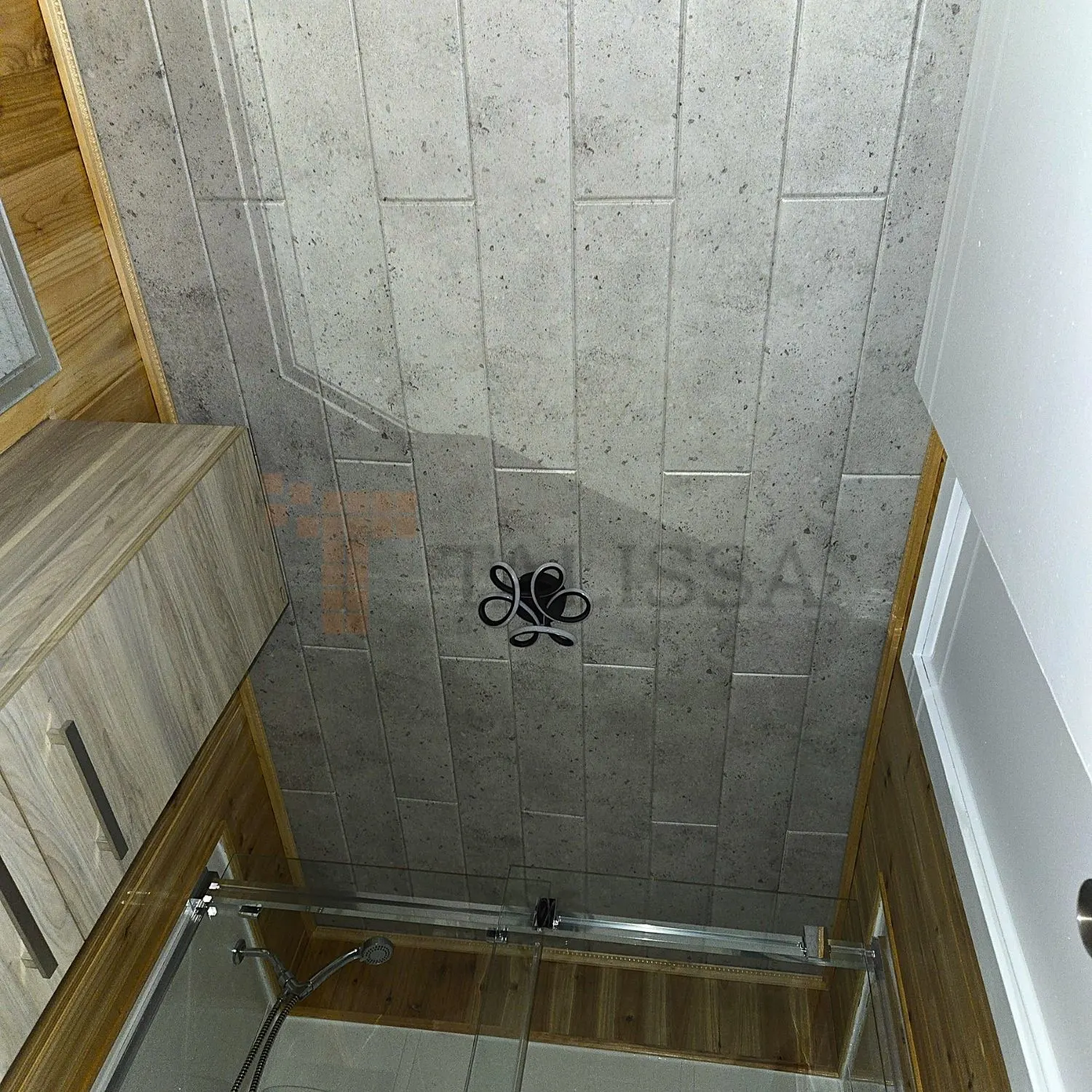 Modern washroom ceiling in Chateau-Richer featuring Concrete Look Foam Ceiling Planks installed above a glass shower with wooden accents.
