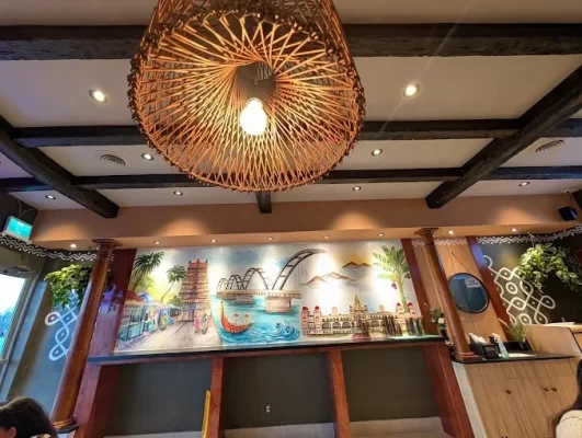 High-resolution view of the stunning faux wood beam ceiling at Aaha Restaurant in Scarborough, ON.