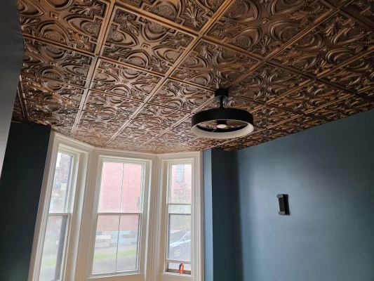 Elegant office space featuring TD11 Victorian faux tin ceiling tiles in a rich aged copper finish.