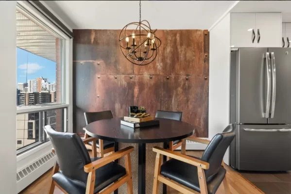 condo design with riveted metal mural