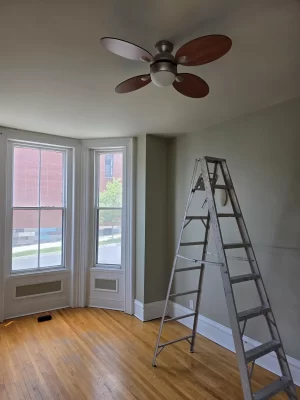 Plain and bare office ceiling in New Brunswick before the installation of decorative faux tin tiles.