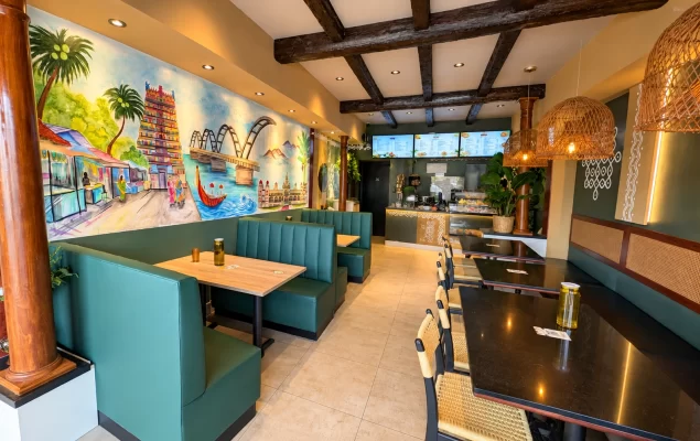 Beautiful ceiling design using dark walnut faux wood beams to create a cozy dining atmosphere.