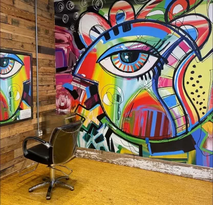 MU1592 Picasso abstract wall mural behind a styling chair in a South River, NJ hair salon